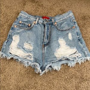 Distressed denim shorts